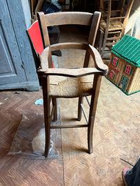 Seggiolone antico in legno