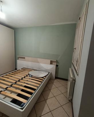 letto con testata 