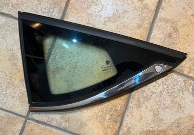 Deflettore vetro fisso posteriore lancia delta sx