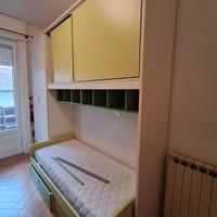 armadio a ponte con lettino