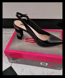 Décolleté slingback nere con tacco gioiello