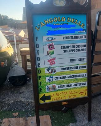 insegna in legno
