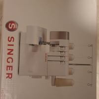 taglia e cuci singer