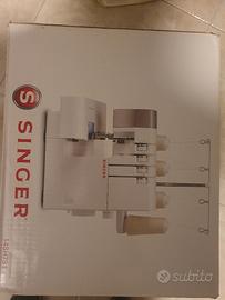 taglia e cuci singer
