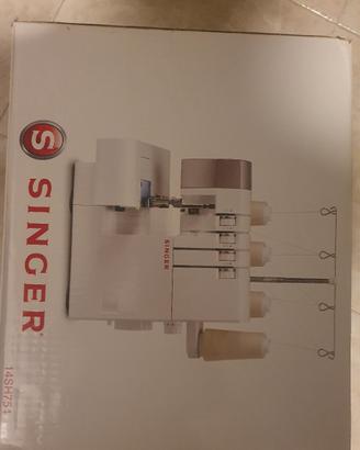 taglia e cuci singer