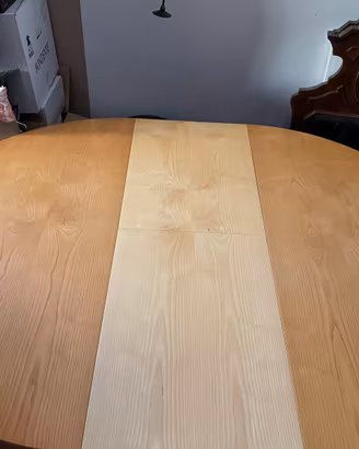 Tavolo tondo con piede in marmo