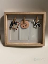 Portafoto con cornice in legno.