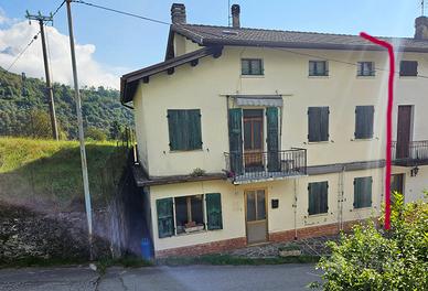 Testa di schiera con terreno agricolo