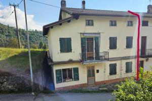 Testa di schiera con terreno agricolo