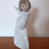 Angelo Lladrò con lanterna, porcellana splendente