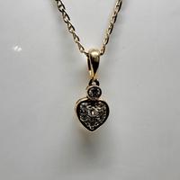 Collana e ciondolo oro 18kt con 7 brill. 910/24