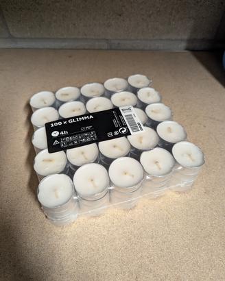 Ikea Candele 100 pezzi e 2 portacandela