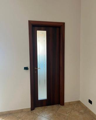Porta scorrevole a libro