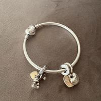 Bracciale pandora con due ciondoli