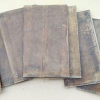 Sette tavolette in noce per restauri