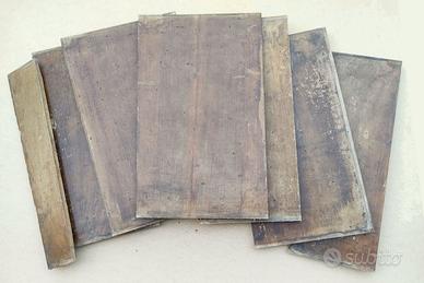 Sette tavolette in noce per restauri