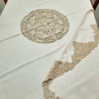 tovaglia rotonda in lino e ricamo