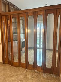 Porta a soffietto in noce e cristallo