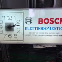 Orologio da muro pubblicitario, illuminato .