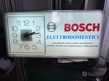 Orologio da muro pubblicitario, illuminato .