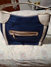 borsa  a mano, marca Carpisa di tessuto blu