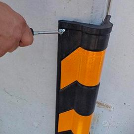 Paraspigoli rifrangente giallo e nero in gomma 