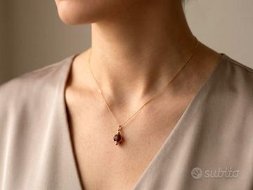 Ciondolo Bulgari in oro e ambra