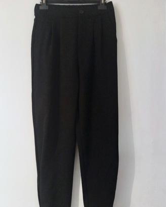 Pantaloni Dazy vita alta con bottoni all'orlo. 