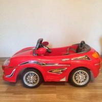 Macchinina rossa elettrica per bambini con telecom