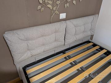 Letto matrimoniale contenitore testiera imbottita