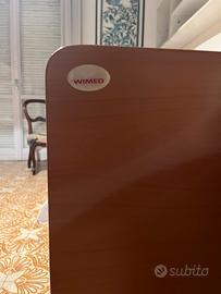 Letto per disabili con materasso antidecupito.