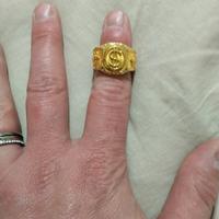 anello$ con simbolo e zirconi 