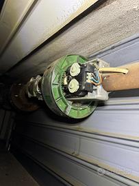 Motore elettrico per saracinesca con blocco