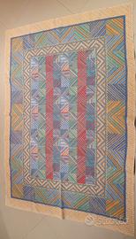 Tappeto intrecciato a mano