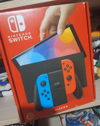 Nintendo switch Oled MAI usata+Super Mario Wonder