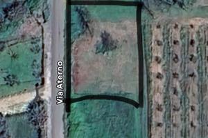 Terreno agricolo con pozzo e recinto leggi sotto