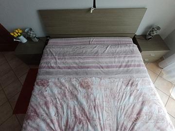 Letto como' e comodini stile moderno
