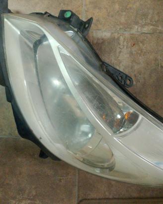 faro clio 3 lato sx
