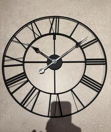 Orologio in metallo da parete