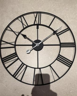 Orologio in metallo da parete