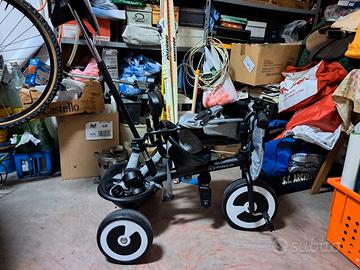 triciclo passeggino