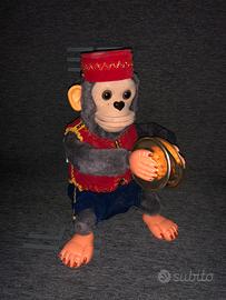 Giocattolo/ciondolo "Mister Monkey" con piatti