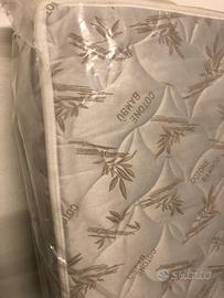 Materasso singolo più rete a doghe