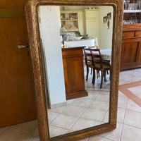 Specchio con cornice dorata vintage