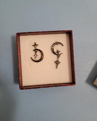 orecchini assimetrici acciaio