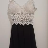 Vestito pantagonna con ricami in pizzo