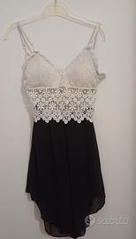 Vestito pantagonna con ricami in pizzo