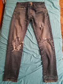 jeans blu strappati 