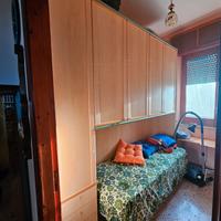 Armadio a ponte con rete e materasso singolo