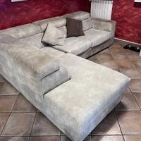 Divano artigianale in alcantara-poggiatesta letto